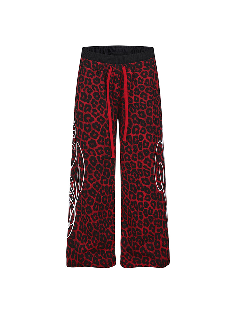 High-street red and black leopard pattern wide-leg joggers with gothic graphic detail
