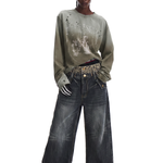 Full-length front view of a model in charcoal grey wide-leg denim jeans and a long-sleeve neutral top.