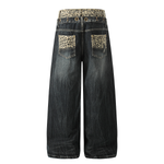 Back product shot of charcoal grey baggy jeans highlighting the contrast pocket stitching and leopard print waist trim.