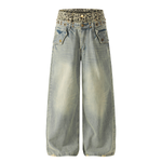 Front product shot of light wash baggy denim jeans featuring a leopard print inner waistband detail.