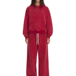 Woman in burgundy red heavyweight fleece tracksuit