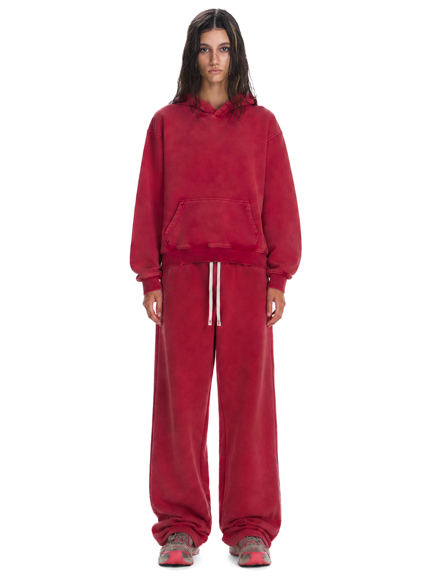 Woman in burgundy red heavyweight fleece tracksuit