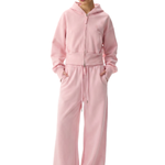 Full body shot of pink oversized cropped hoodie set, industrial minimalist fashion