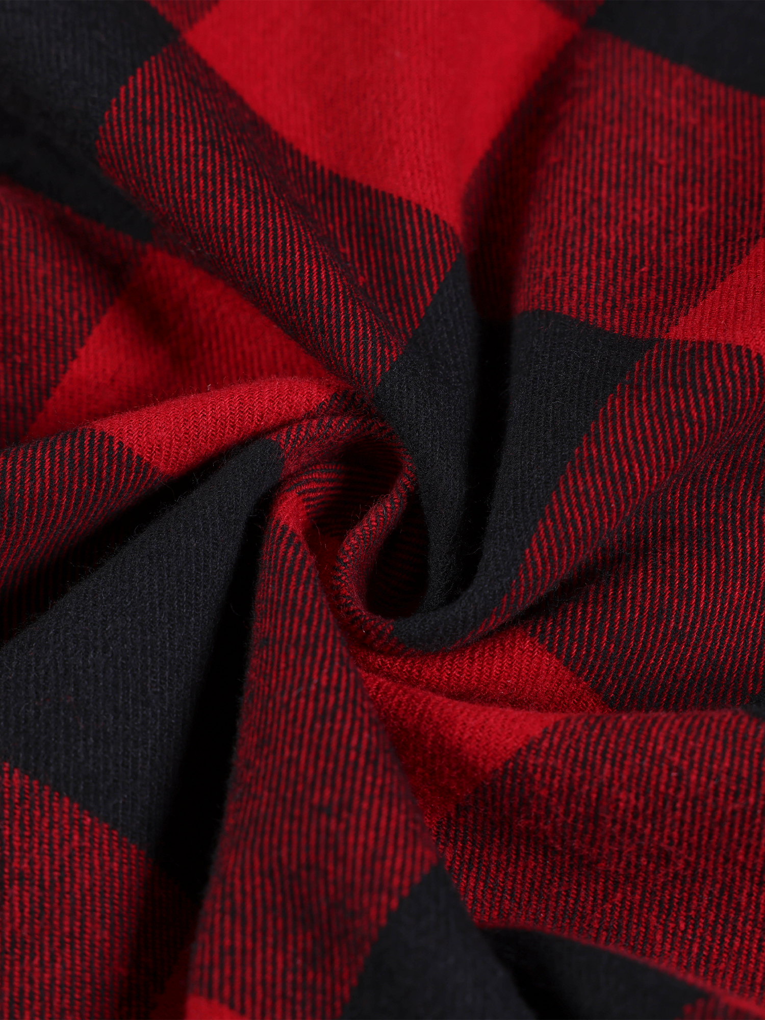 Close-up of premium cotton-blend red and black checkered fabric for durable streetwear wear.