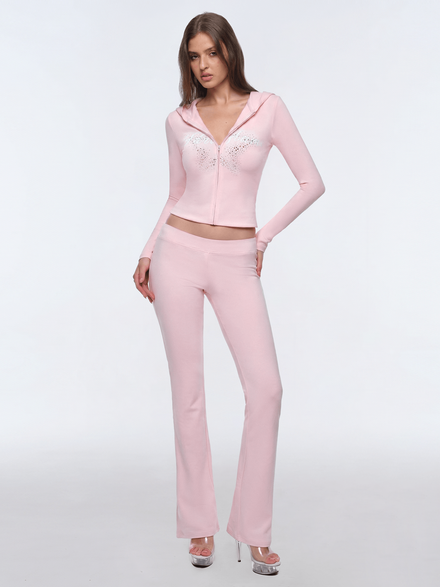 Front view of model wearing Stellar Zip Hoodie / Flare Pants in Pink - FDR