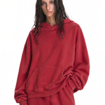 Close-up of woman in dark red oversized hoodie and joggers set