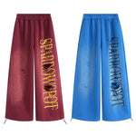 FDR Studios high-street collection featuring burgundy and blue oversized wide-leg streetwear pants.
