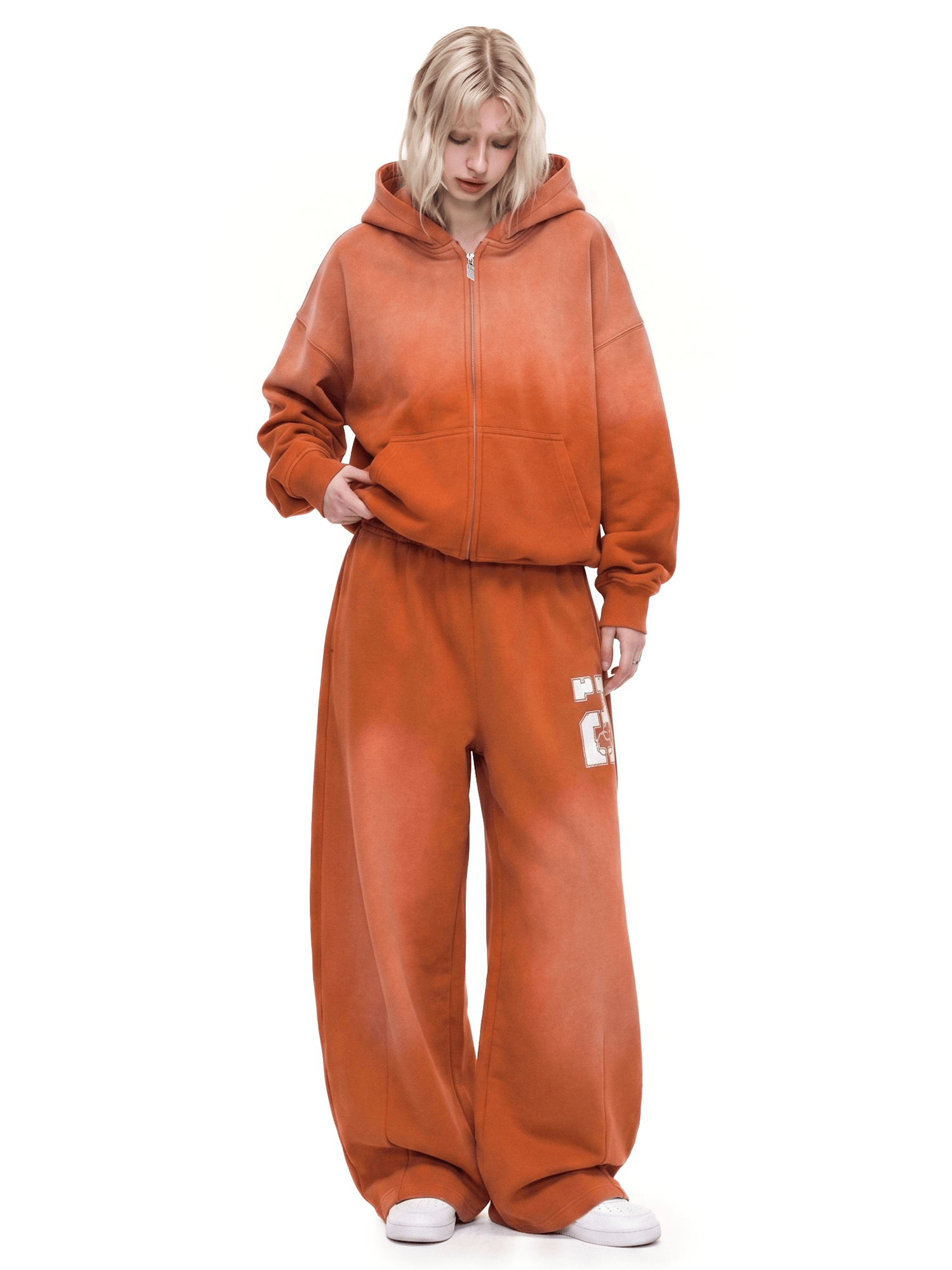 Pantalones deportivos holgados con efecto pulverizado degradado