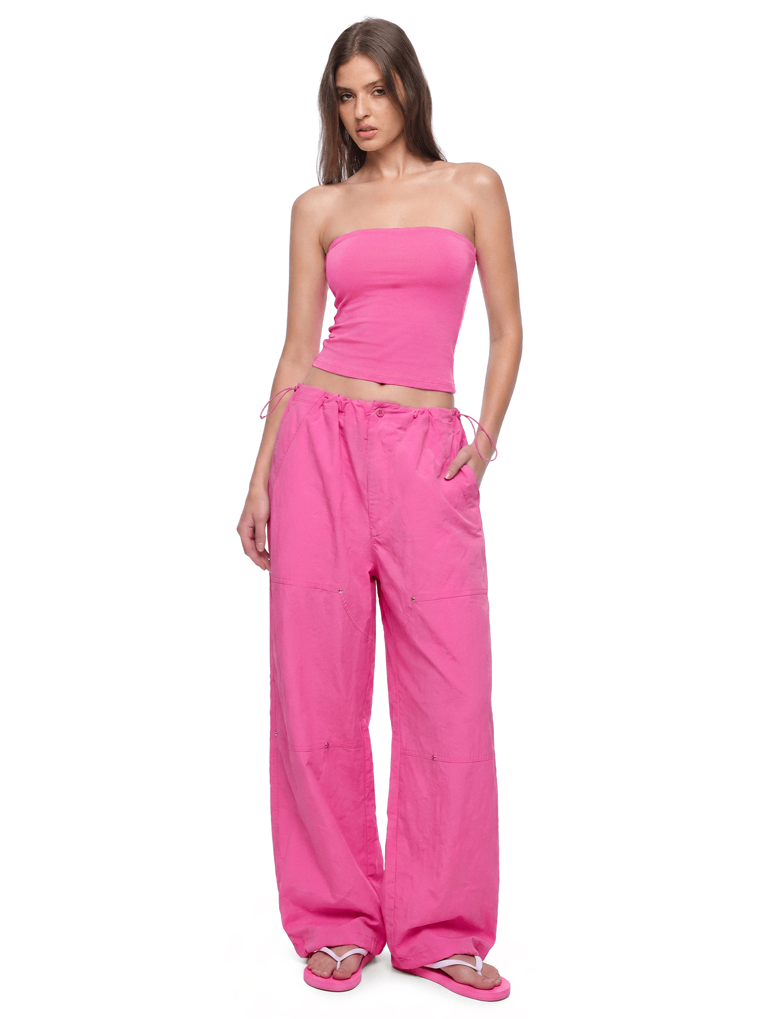 Side angle perspective of Baggy Parachute Cargo Pants in Rose - FDR