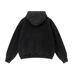 Back view of a black heavy-weight oversized zip-up hoodie showing hood detail.