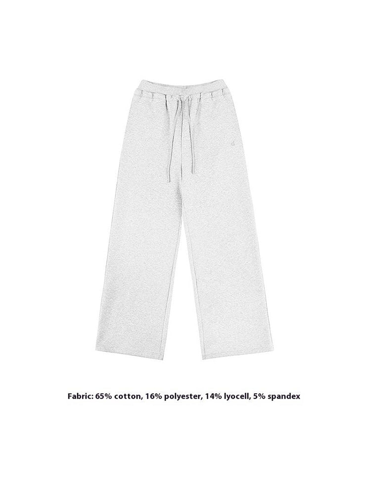light gray wide-leg sweatpants  illustrating a clean, minimal loungewear pants with a relaxed, premium feel.