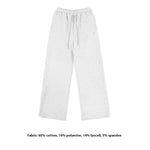 light gray wide-leg sweatpants  illustrating a clean, minimal loungewear pants with a relaxed, premium feel.