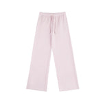 A simple flat-lay image of soft pink wide-leg sweatpants, featuring an adjustable drawstring waist. A stylish and comfortable option for modern women's loungewear collections.