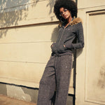 Full streetwear tracksuit featuring a grey oversized zip-up and matching sweatpants.