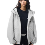 Multiple angles of model in grey high-neck hoodie, showcasing structured fabric and minimalist design.