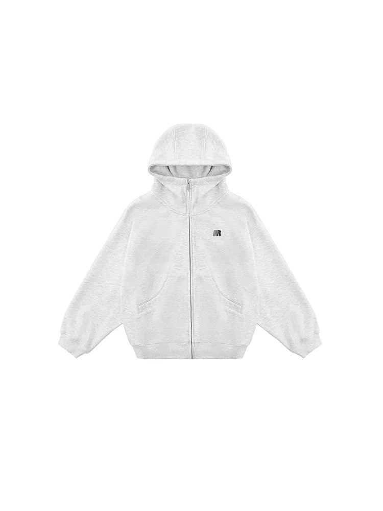 Flat lay of light gray high-neck zip hoodie, featuring clean visual lines and oversized kangaroo pockets.