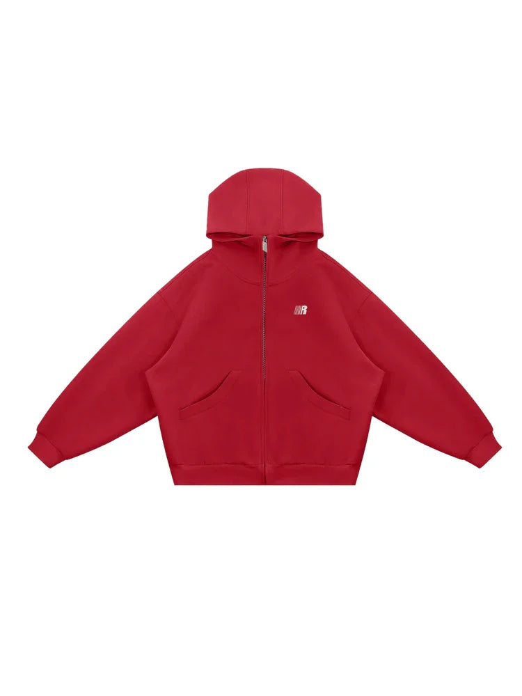 Flat lay of red and white high-neck hoodies, highlighting the smooth fabric texture in different shades.